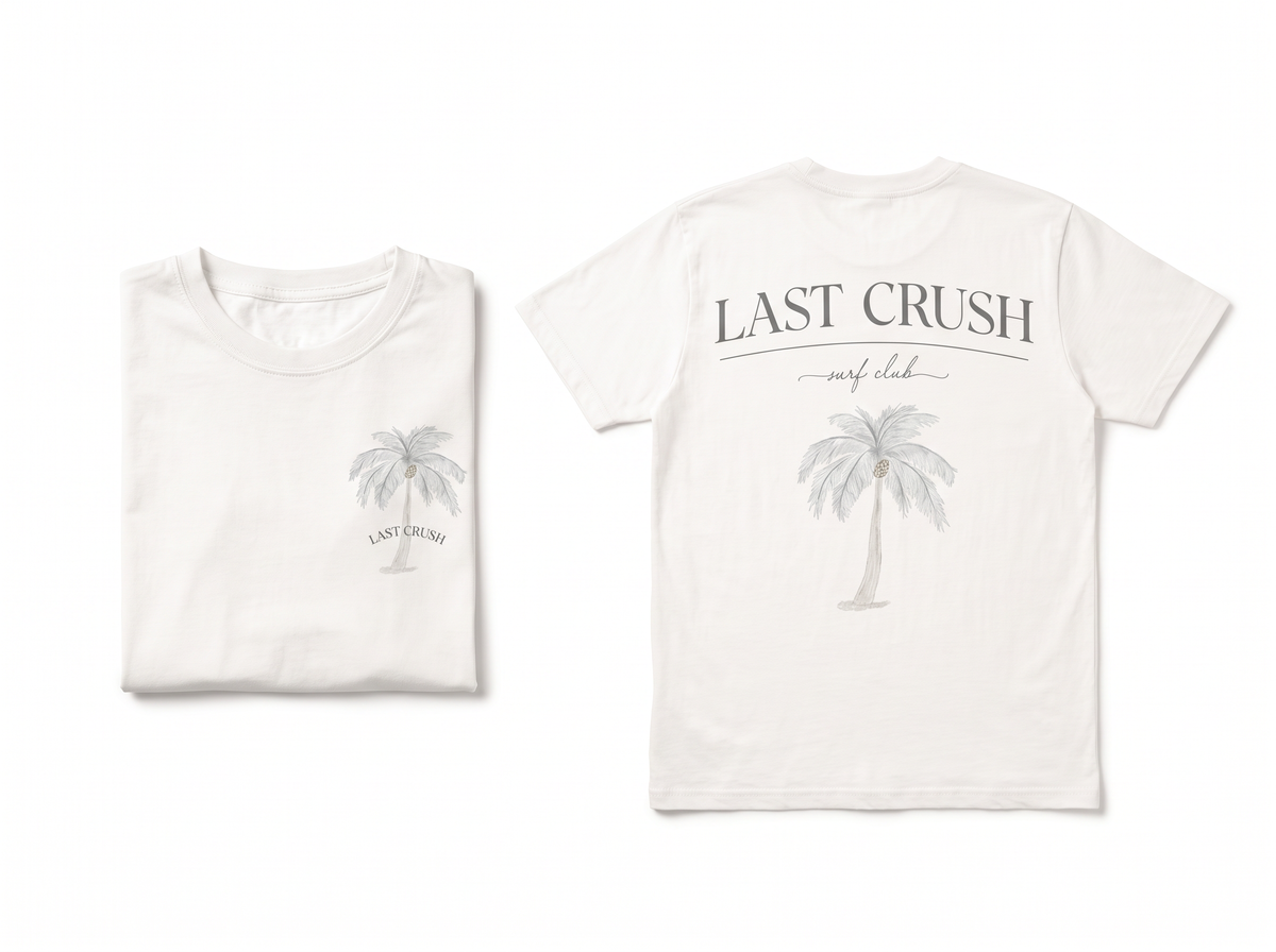 An off-white short-sleeve t-shirt shown from both the front and back. The front features a small gray palm tree graphic with 'LAST CRUSH' printed below it.